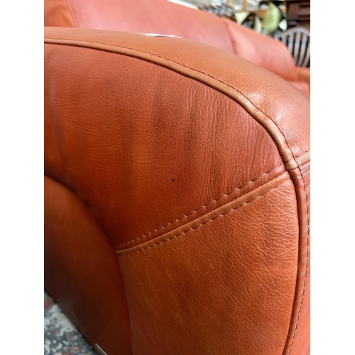 233 - An Italian Marinelli orange leather sofa - approx. 79cm high x 214cm wide x 98cm deep