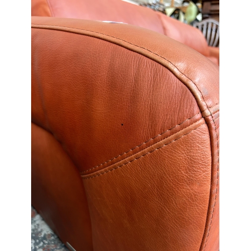 233 - An Italian Marinelli orange leather sofa - approx. 79cm high x 214cm wide x 98cm deep