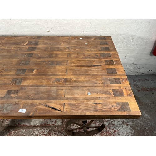 150 - A bespoke pine and black metal industrial style cart dining table - approx. 80cm high x 90cm wide x ... 