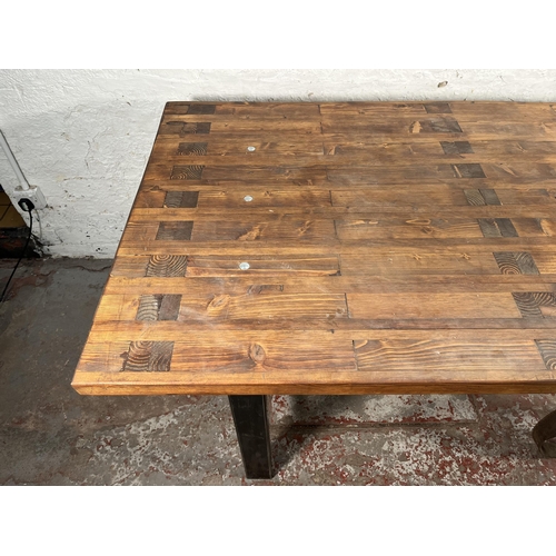 150 - A bespoke pine and black metal industrial style cart dining table - approx. 80cm high x 90cm wide x ... 