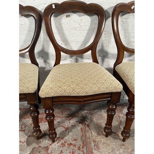 151 - Three Victorian mahogany balloon back dining chairs