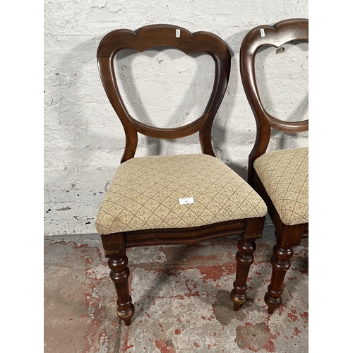 151 - Three Victorian mahogany balloon back dining chairs