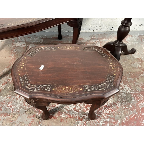 155 - Three Indian brass and copper inlaid carved hardwood occasional tables