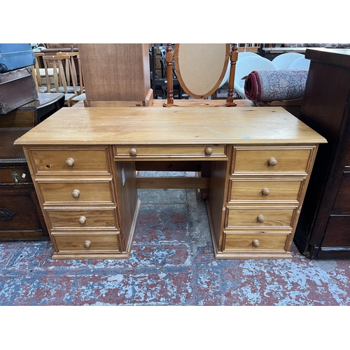 156 - A solid pine pedestal desk - approx. 75cm high x 142cm wide x 59cm deep