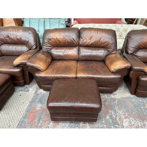 243 - A brown leather five piece lounge suite comprising two seater sofa, two armchairs and two footstools