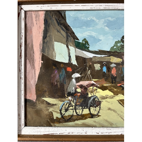 245 - A mid 20th century framed oil on canvas of an Oriental market scene, signed lower right - approx. 50... 