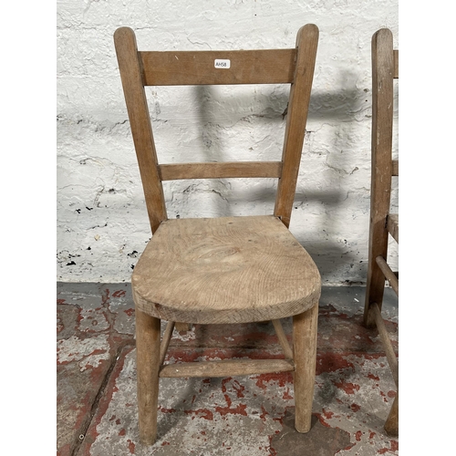 165 - A pair of vintage elm and beech child's chairs