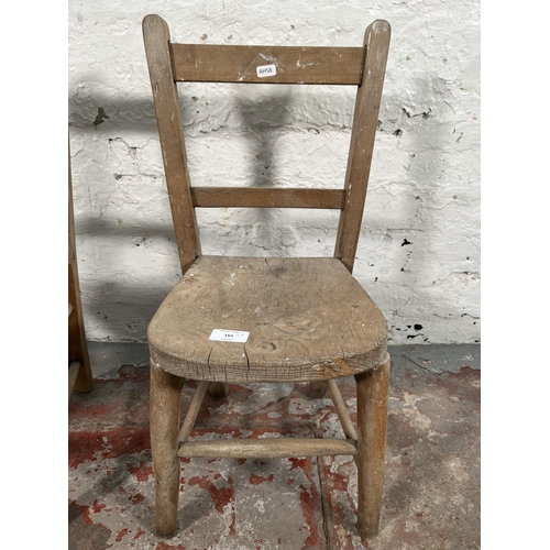 165 - A pair of vintage elm and beech child's chairs