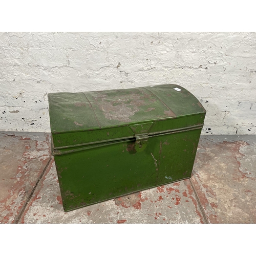 168 - An early 20th century green painted tin travel trunk