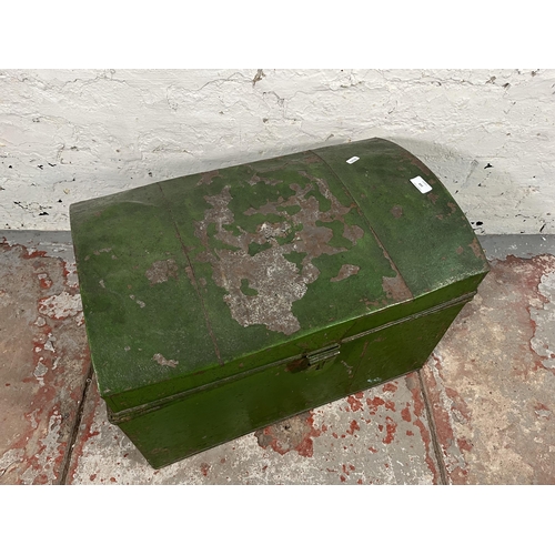 168 - An early 20th century green painted tin travel trunk