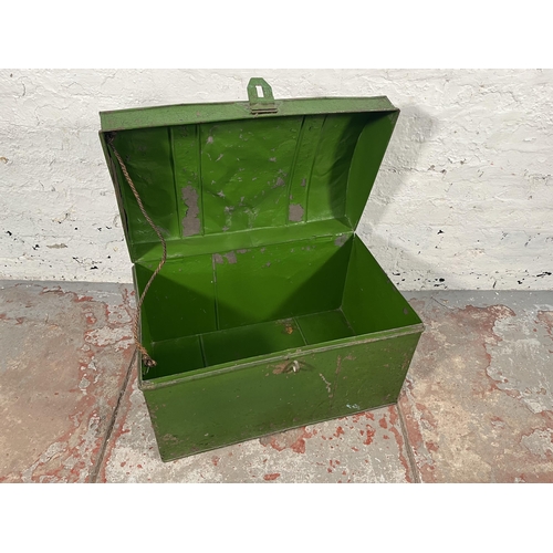 168 - An early 20th century green painted tin travel trunk