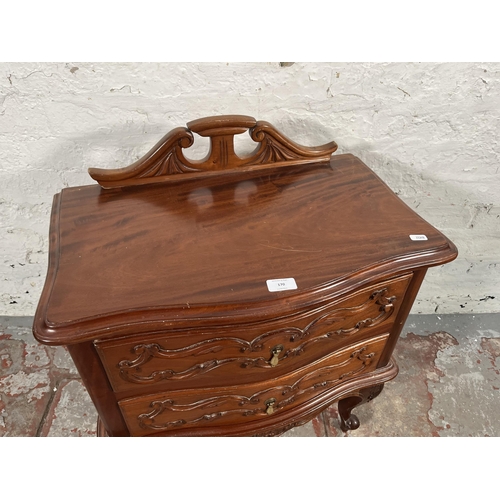 170 - A French style carved mahogany bedside chest of two drawers with cabriole supports