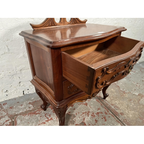 170 - A French style carved mahogany bedside chest of two drawers with cabriole supports