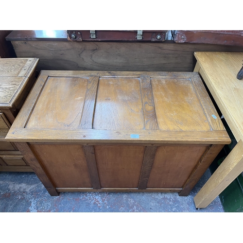 171 - A mid 20th century oak blanket box - approx. 70cm high x 103cm wide x 56cm deep