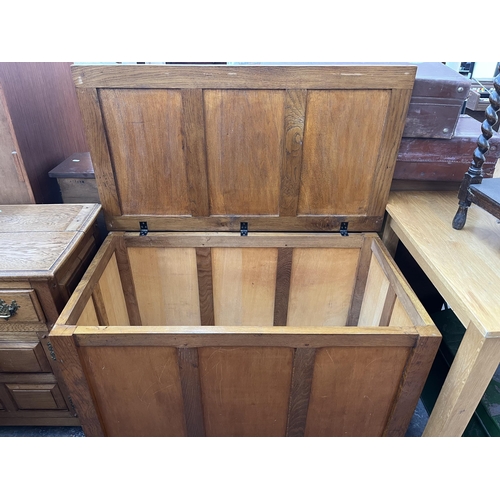 171 - A mid 20th century oak blanket box - approx. 70cm high x 103cm wide x 56cm deep