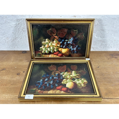 261 - Two gilt framed fruit still life oil paintings on canvas - approx. 26cm high x 40cm wide