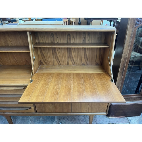 187 - A Younger teak highboard - approx. 131cm high x 144cm wide x 46cm deep