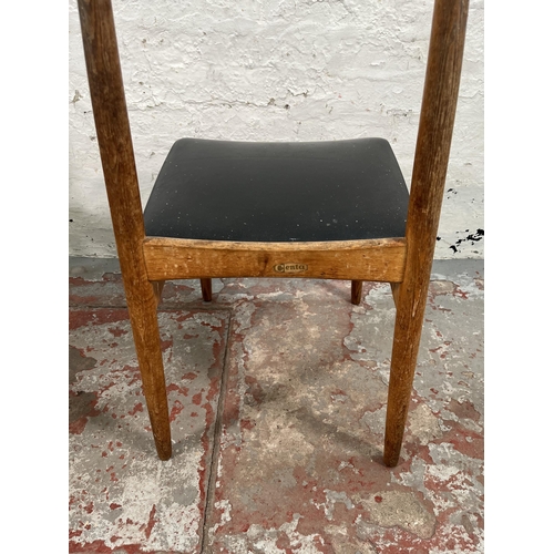 189 - A pair of Centa teak and black vinyl dining chairs