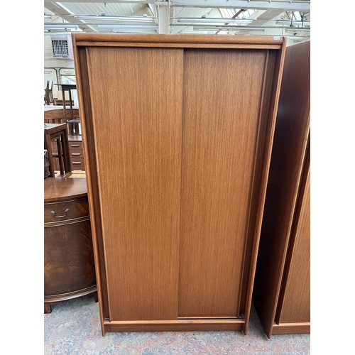 193 - Two Austinsuite teak double wardrobes