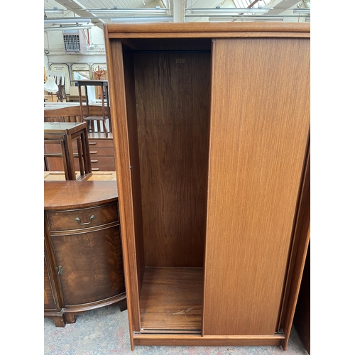 193 - Two Austinsuite teak double wardrobes