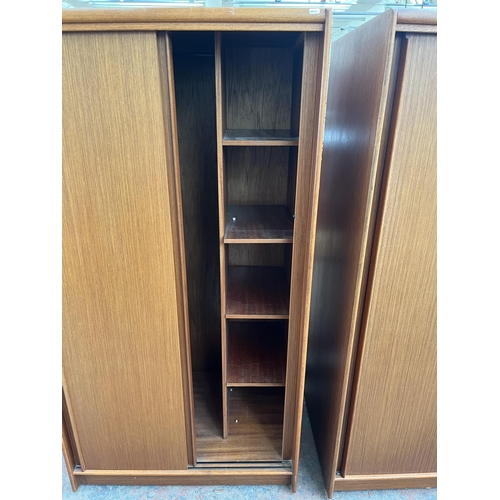 193 - Two Austinsuite teak double wardrobes