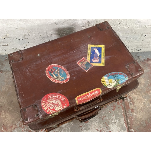 194 - Three vintage brown leather suitcases