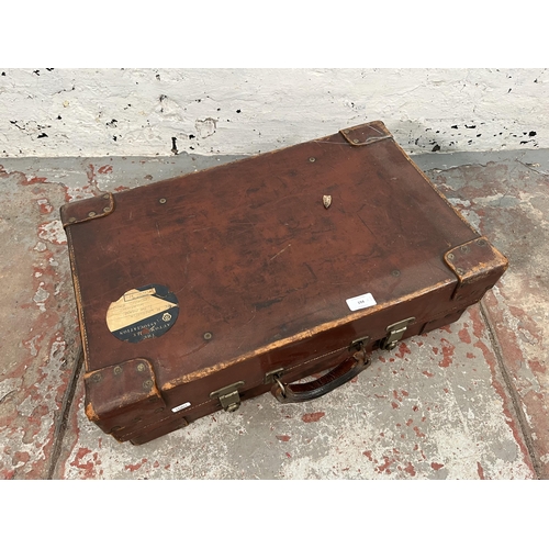 194 - Three vintage brown leather suitcases