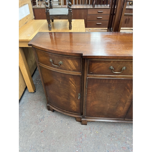 195 - A Bevan Funnell Ltd Reprodux mahogany breakfront sideboard