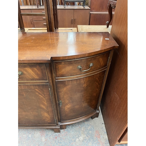 195 - A Bevan Funnell Ltd Reprodux mahogany breakfront sideboard