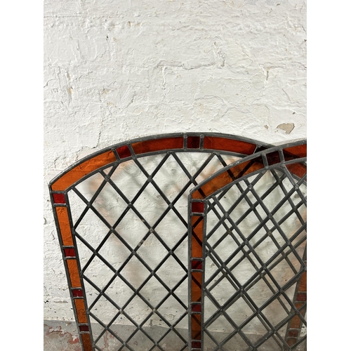 279 - Three stained and leaded glass arched windows - approx. 100cm high x 85cm wide