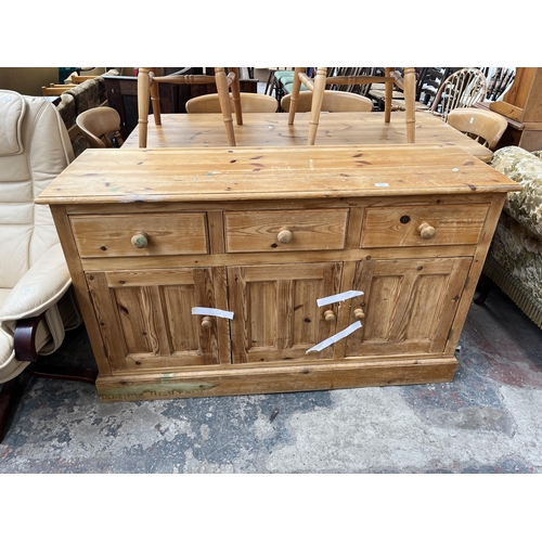 206 - A solid pine sideboard