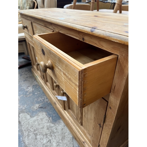 206 - A solid pine sideboard