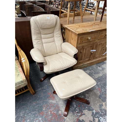 207 - A Stressless style cream leatherette and bentwood swivel reclining armchair and footstool