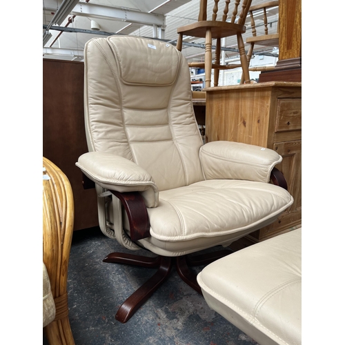 207 - A Stressless style cream leatherette and bentwood swivel reclining armchair and footstool