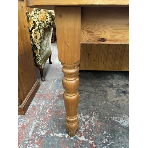 212 - A Victorian style pine farmhouse dining table - approx. 77cm high x 74cm wide x 152cm long