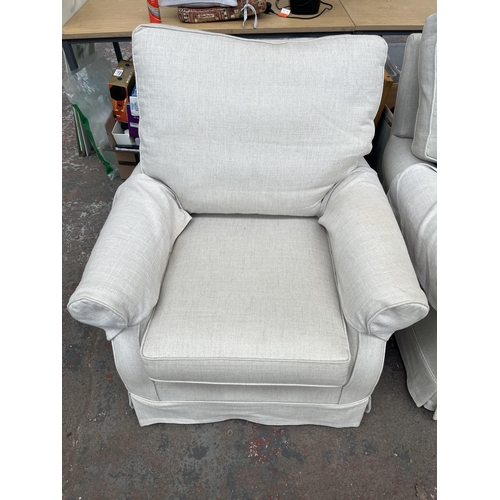 217 - A pair of Multiyork fabric upholstered armchairs