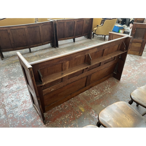 231 - An early 20th century pine church pew - approx. 85cm high x 164cm wide x 47cm deep