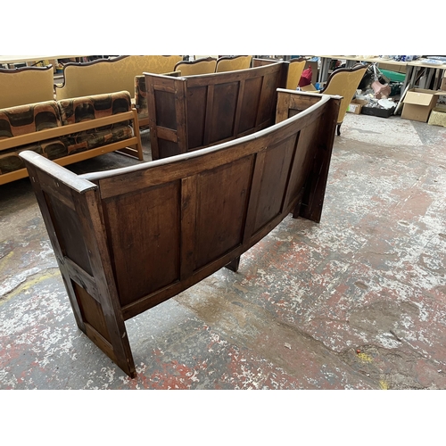 232 - An early 20th century pine curved church pew - approx. 85cm high x 165cm wide x 45cm deep