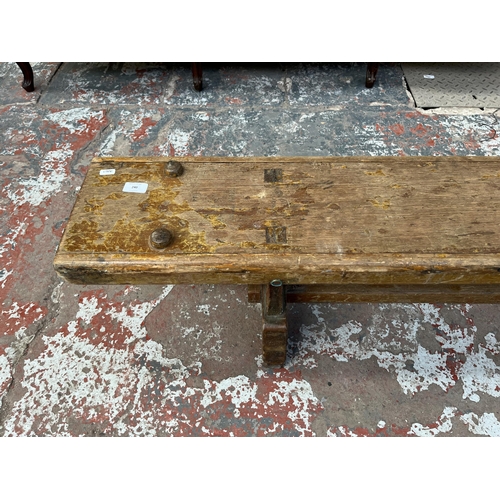 240 - A mid 20th century beech school bench - approx. 34cm high x 24cm wide x 335cm long