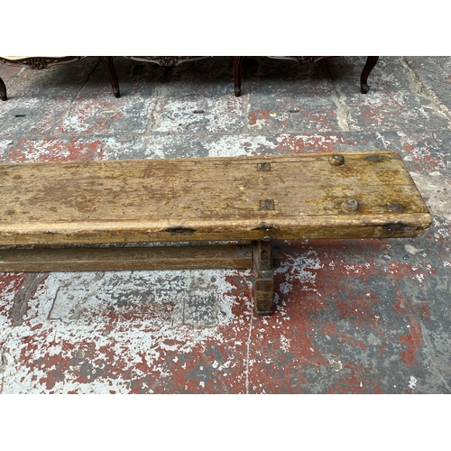 240 - A mid 20th century beech school bench - approx. 34cm high x 24cm wide x 335cm long