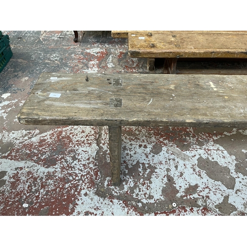 241 - An early 20th century pitch pine bench - approx. 46cm high x 27cm wide x 376cm long