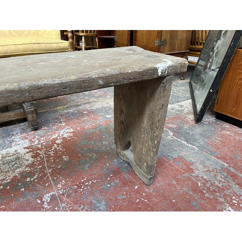 241 - An early 20th century pitch pine bench - approx. 46cm high x 27cm wide x 376cm long