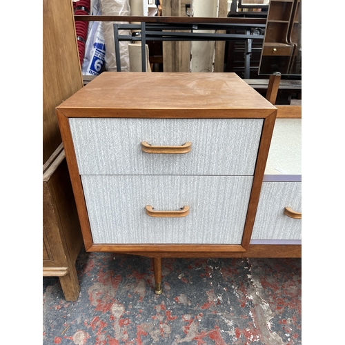 119 - A mid 20th century teak and formica dressing table