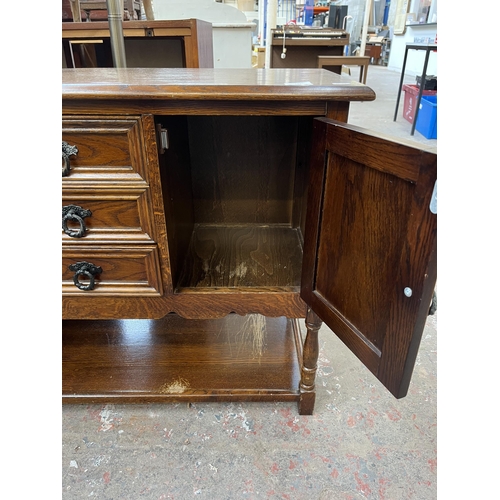 132 - An Old Charm oak linenfold side cabinet