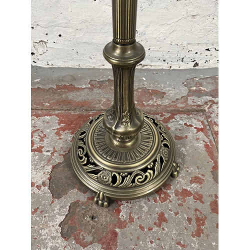 132A - A Victorian style brass effect standard lamp with glass shade - approx. 160cm high