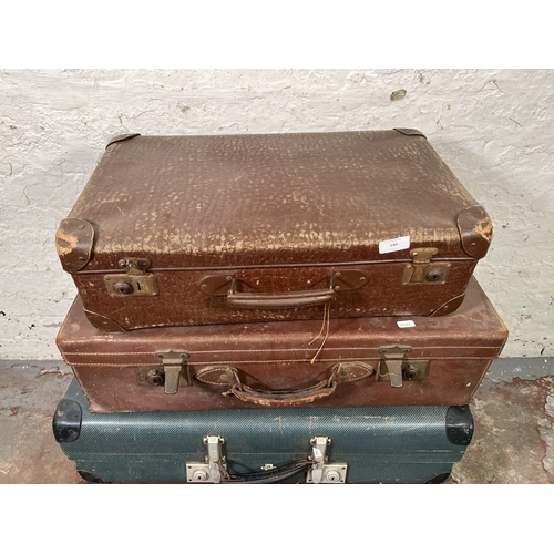 140 - Four vintage suitcases to include Revelation etc.