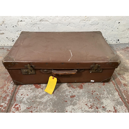 140 - Four vintage suitcases to include Revelation etc.