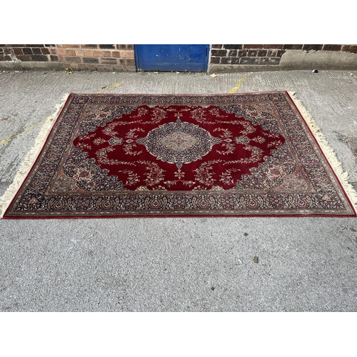 145 - A Phoenix Carpets Teheran rug - approx. 250cm x 180cm