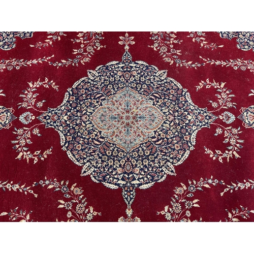 145 - A Phoenix Carpets Teheran rug - approx. 250cm x 180cm