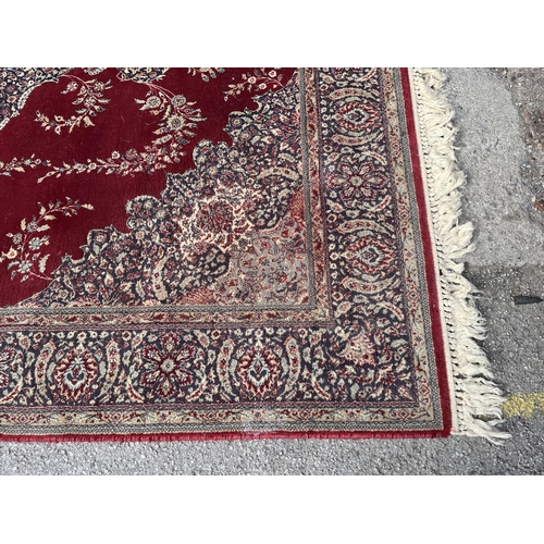 145 - A Phoenix Carpets Teheran rug - approx. 250cm x 180cm